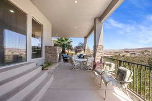 View of patio with outdoor lounge area and a mountain view