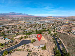 Aerial view of residential area with a mountain backdrop