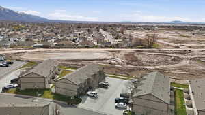 Aerial view of residential area with a mountain backdrop