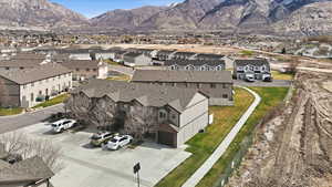 Aerial perspective of suburban area with a mountainous background