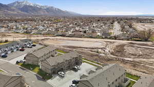 Aerial view of residential area featuring a mountain backdrop