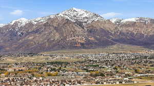 View of mountain background featuring nearby suburban area