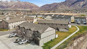 Aerial view of residential area with a mountainous background