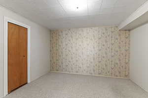 Spare room featuring carpet floors