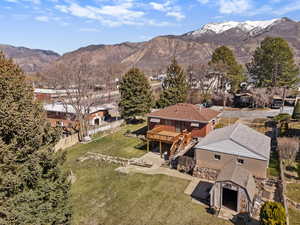 Aerial perspective of suburban area with a mountainous background