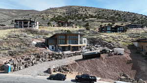 Rear view of property with a mountain view