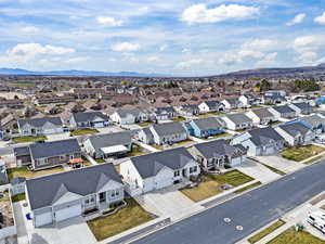 Aerial view of residential area featuring mountains