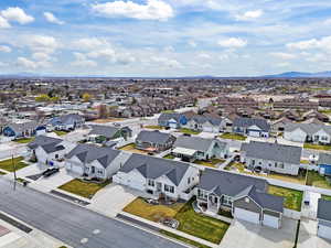 Aerial view of residential area with mountains