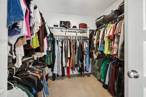 Oversized walk in closet in the primary bedroom.