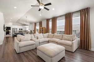 Living room featuring vaulted ceiling, luxury vinyl flooring LVP, ceiling fan, and recessed lighting