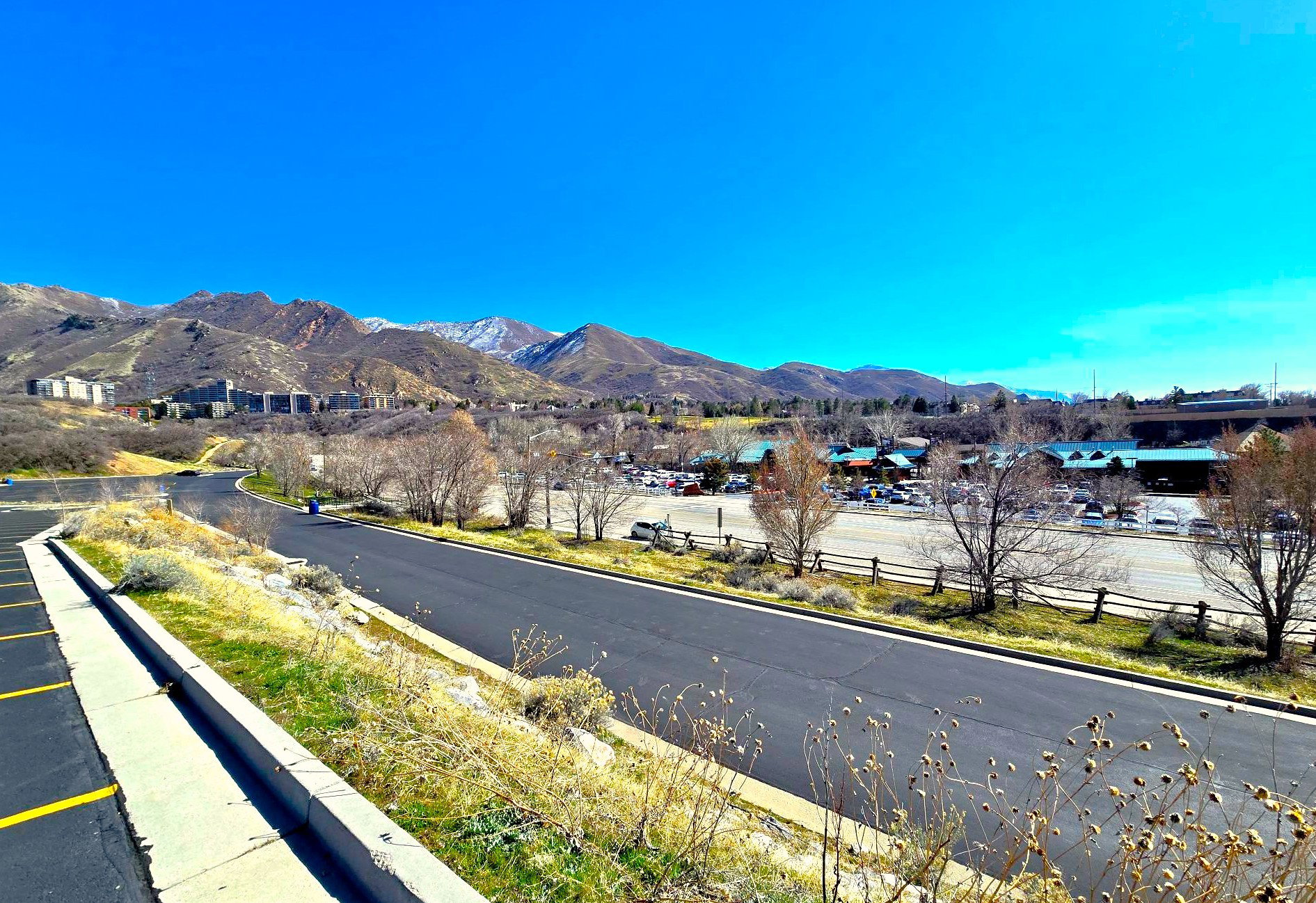 View of Hogle Zoo on the right and the subject red brick building on the left.