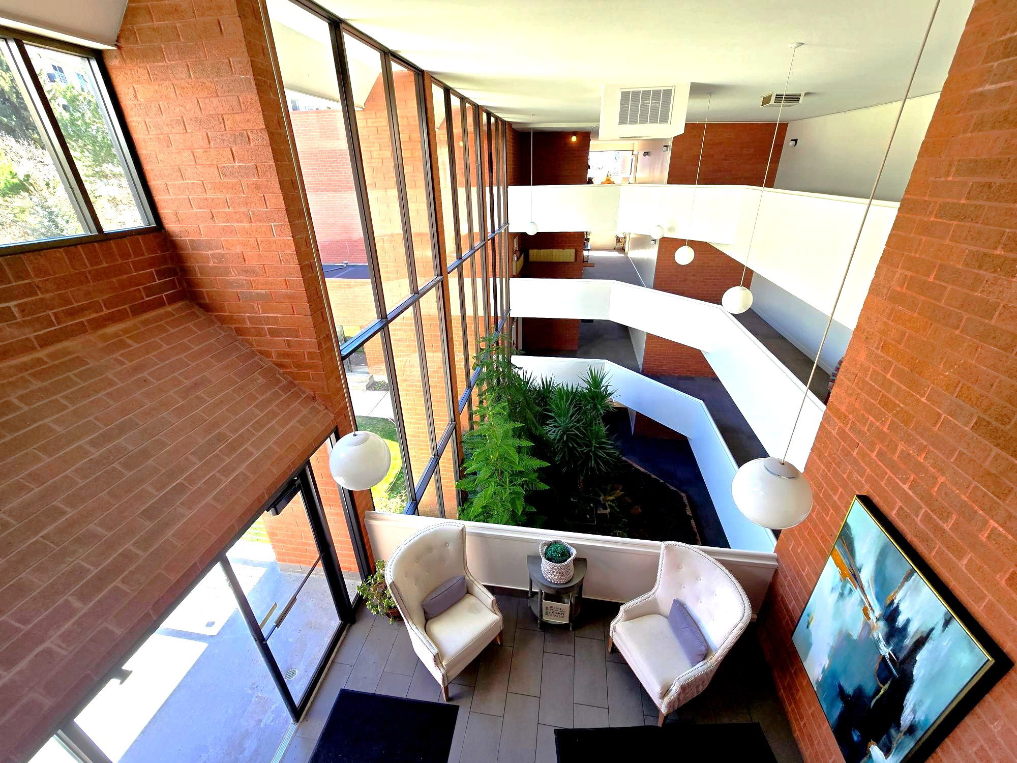 View of balcony overlooking large atrium