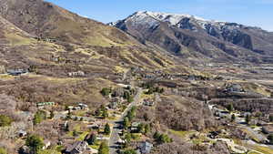 View of mountain backdrop with nearby suburban area