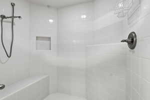 Full bath with tiled shower