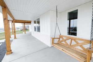 Porch featuring a mountain view