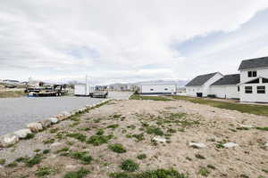View of yard with a mountain view and a residential view