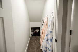 Stairs featuring carpet flooring and baseboards