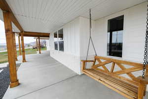 Covered porch with a mountain view