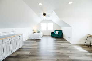 Bedroom featuring dark wood-type flooring and a ceiling fan