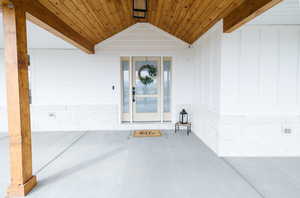 Entrance to property featuring a porch