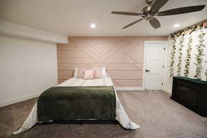 Bedroom with carpet floors, a ceiling fan, and recessed lighting