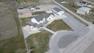 Aerial overview of property's location featuring nearby suburban area