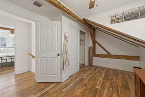 Hall with dark wood-type flooring