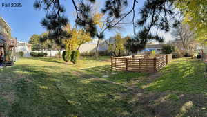 View of yard featuring a vegetable garden
