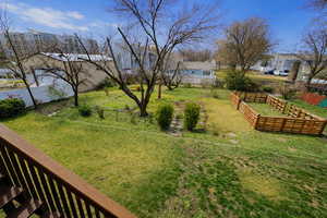 View of yard with a residential view and a garden