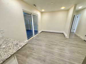 Dining area with doors to covered deck