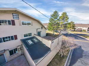 Rear view of property featuring a residential view