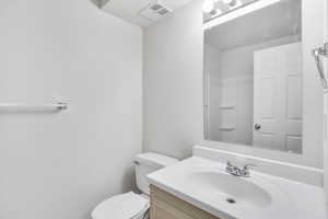 Full bathroom featuring vanity and a shower