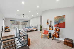 Bedroom with light carpet, recessed lighting, and ceiling fan