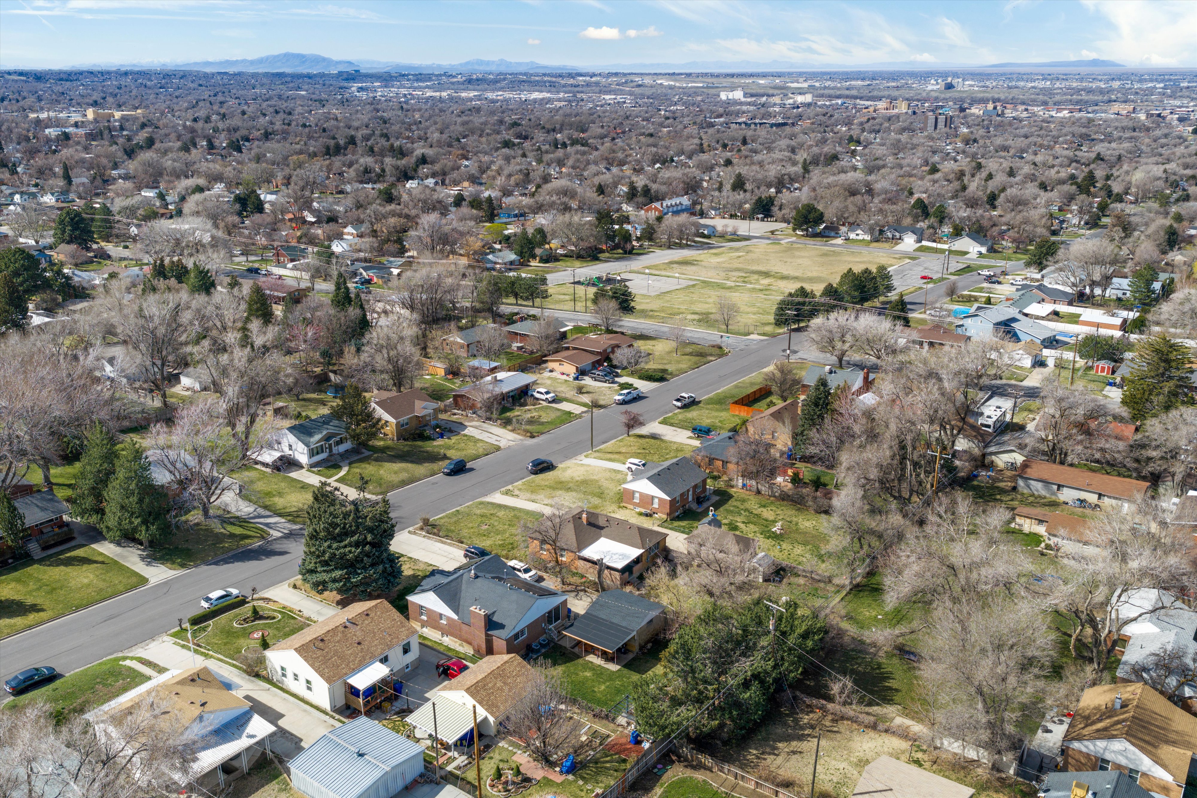 Aerial overview of property's location with nearby suburban area