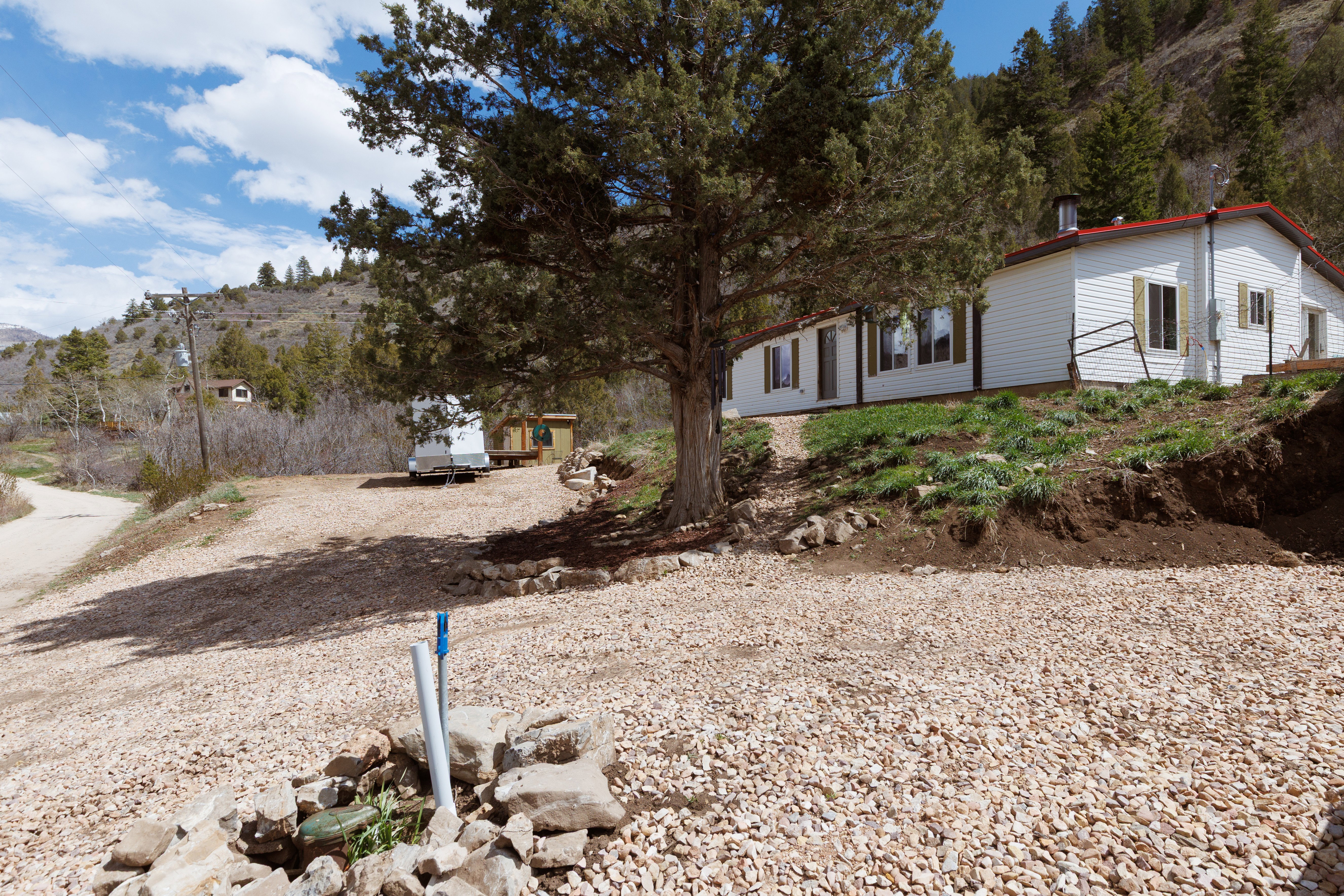 View of front of property and water source