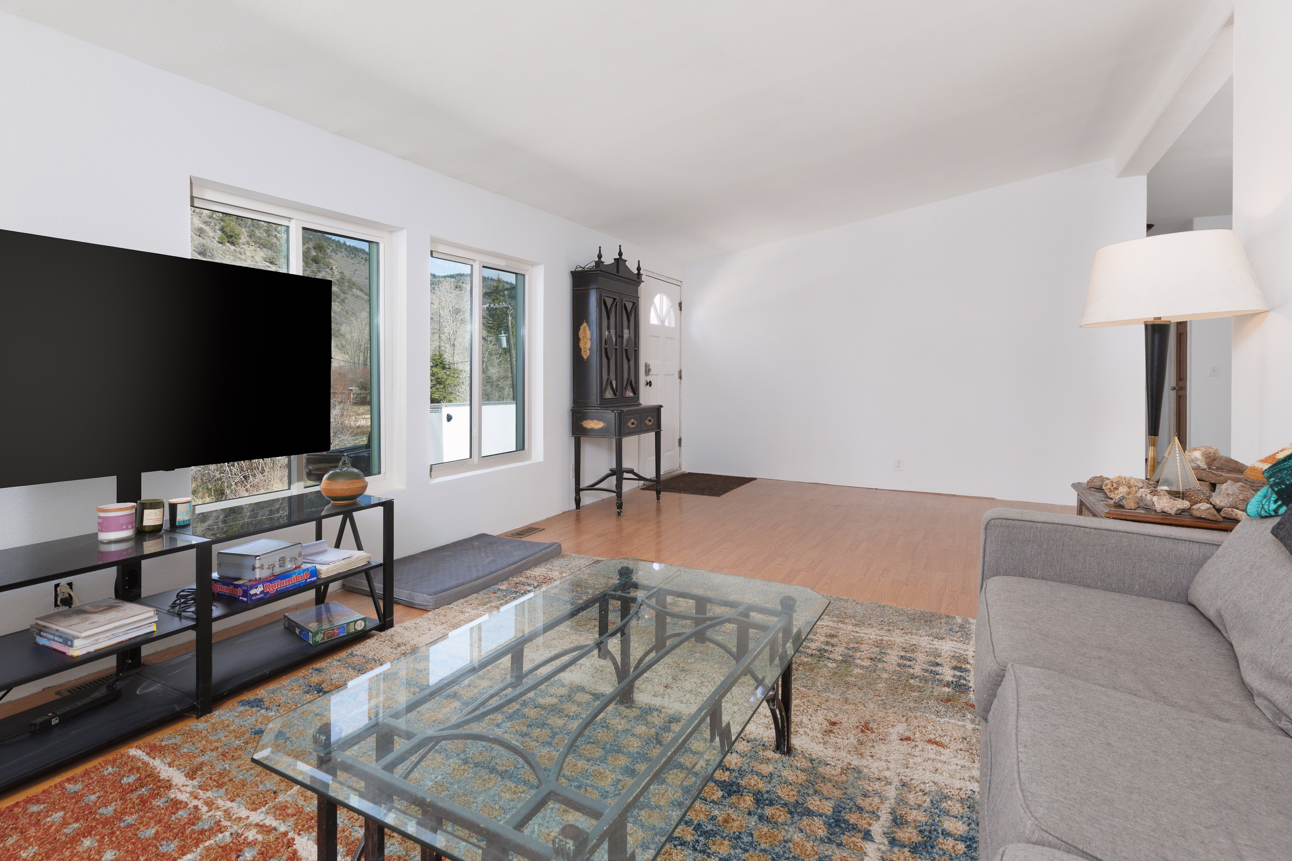 Living area featuring  light wood-style floors