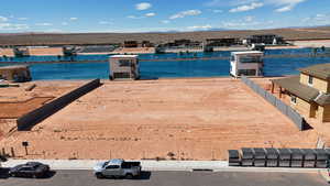 Dock area featuring a water and mountain view
