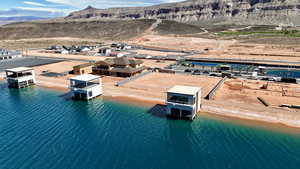 Aerial perspective of suburban area with a mountain backdrop