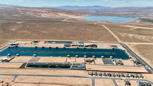 Bird's eye view of a water and mountain view and a desert landscape
