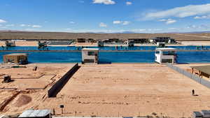 Dock with a water and mountain view