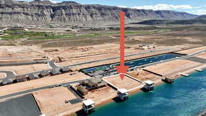 View of property location featuring a mountainous background and a desert landscape