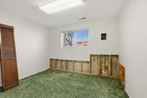 Bedroom with carpet and baseboards