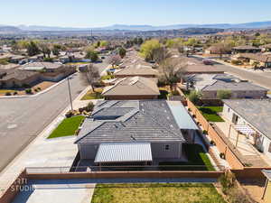 Aerial view of residential area featuring mountains