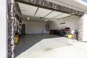 Garage featuring secured water heater