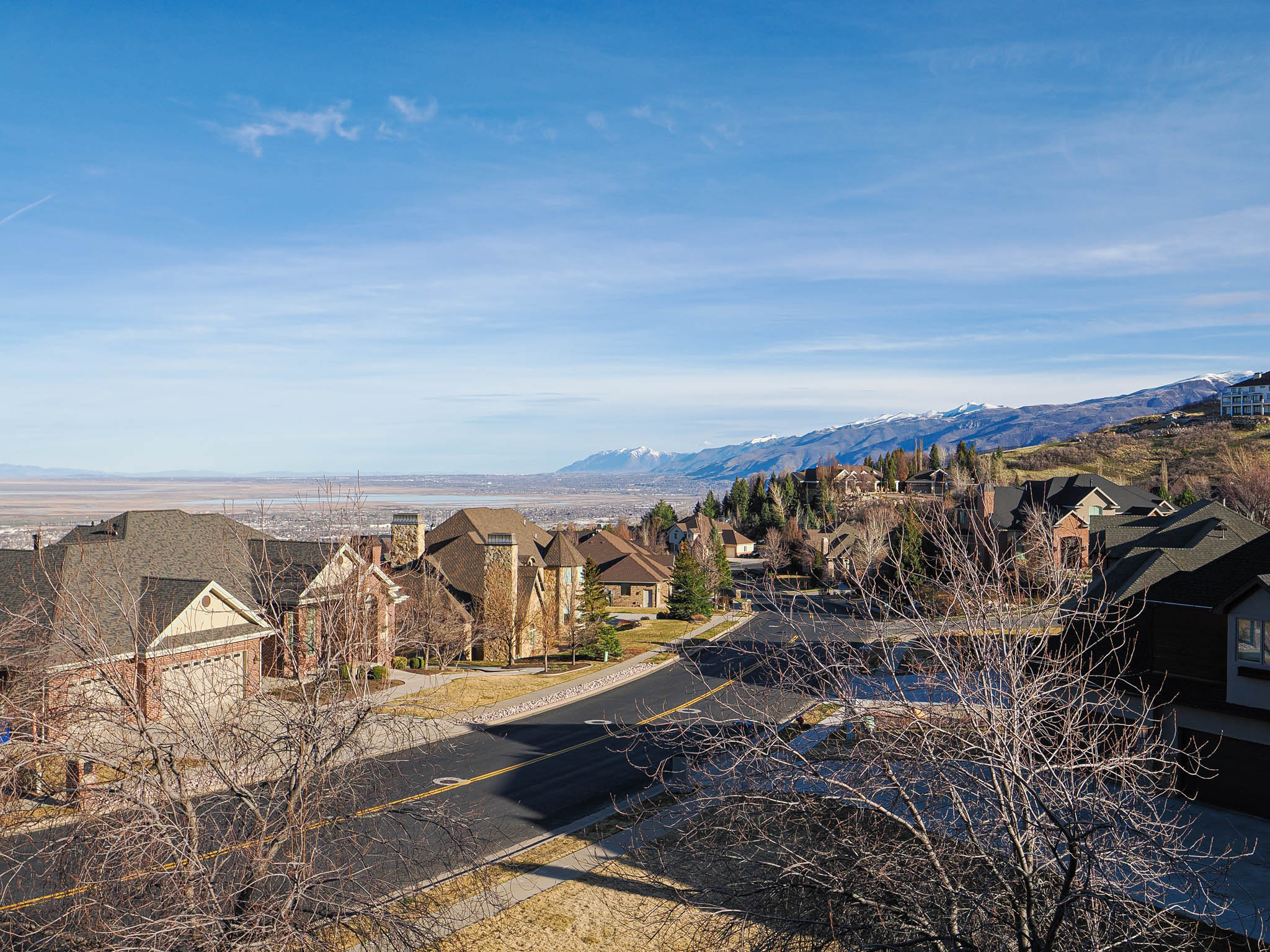 View of mountain backdrop with nearby suburban area