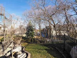 View of yard featuring stairway