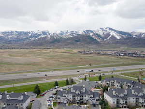 Aerial view of residential area featuring mountains
