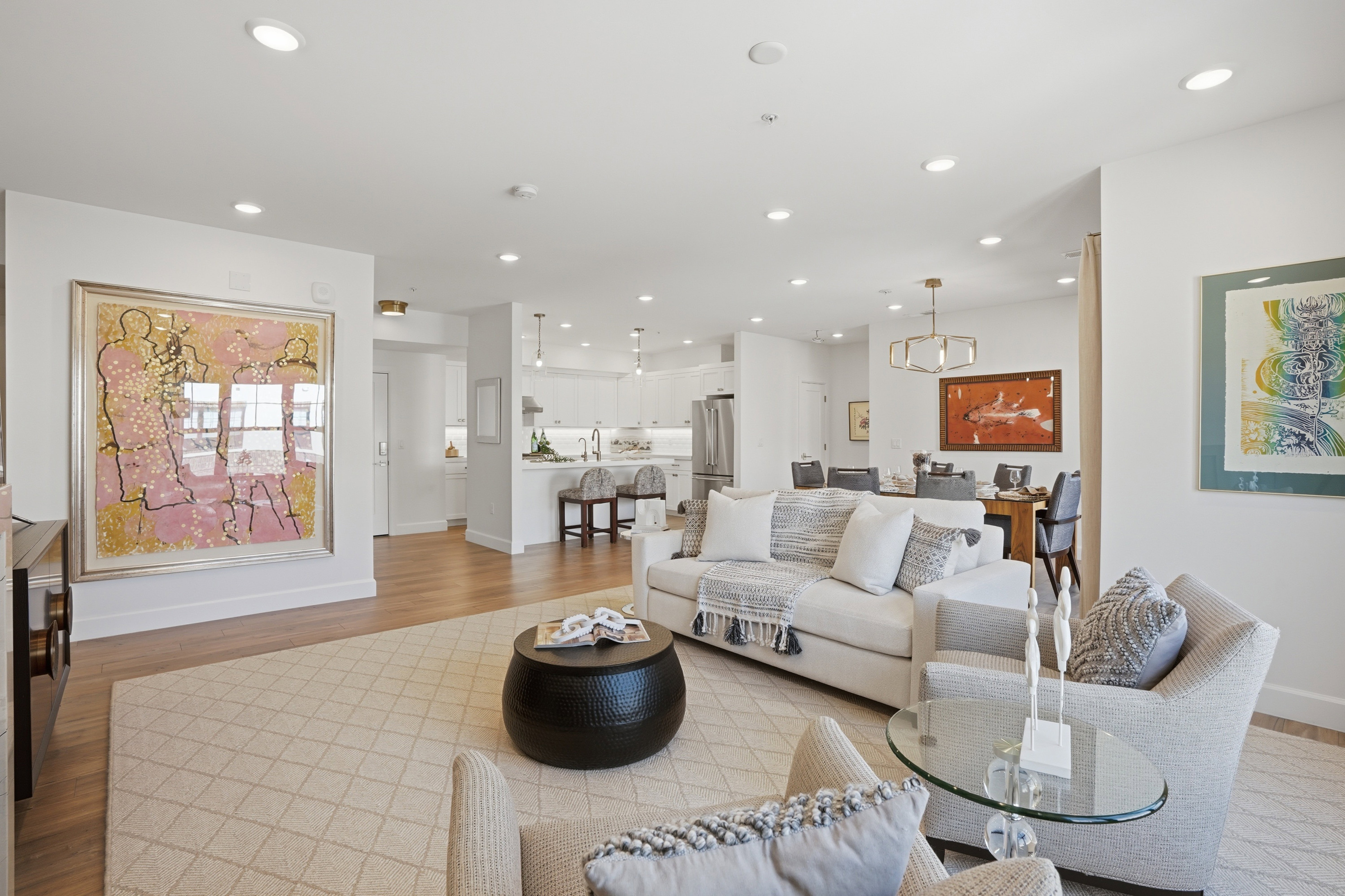 Living room featuring light wood finished floors and recessed lighting