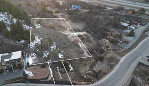 View of property location featuring property boundaries highlighted and nearby suburban area