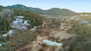 View of mountain backdrop with a large body of water